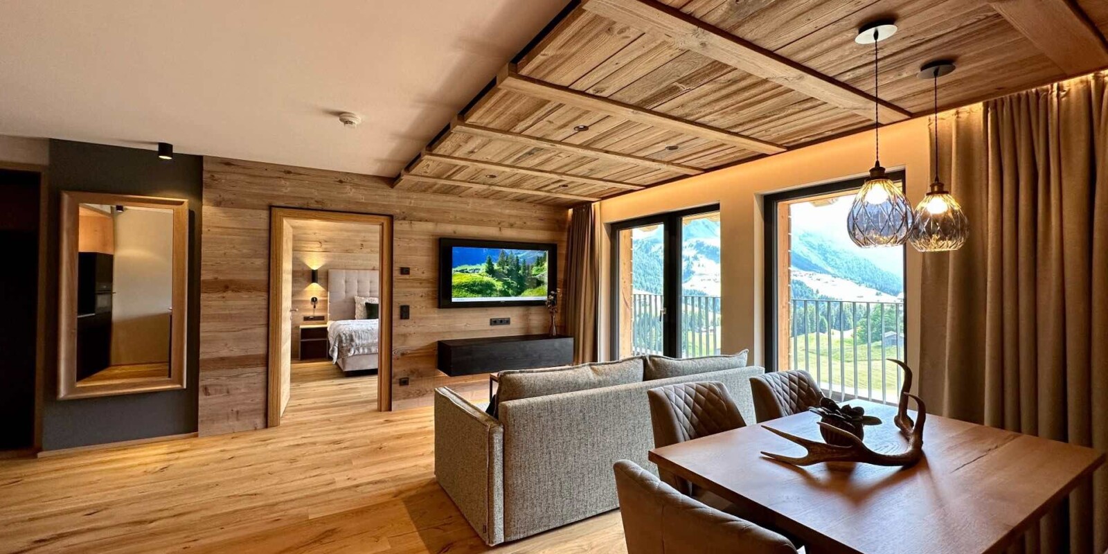 Lodge Biberkopf - Lech Valley Lodge in Warth am Arlberg - Wohnbereich mit Blick zum Biberkopf