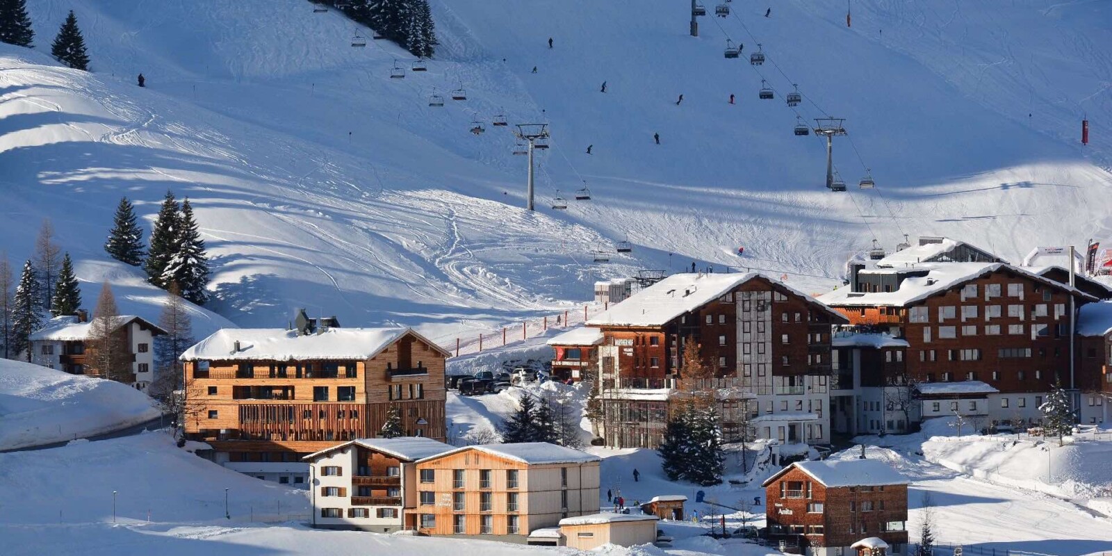 Lodges in Österreich - direkt im Skigebiet auf 1.500 m Höhe - 50 m zum Skilift - traumhafte Lage der Luxus-Lodges