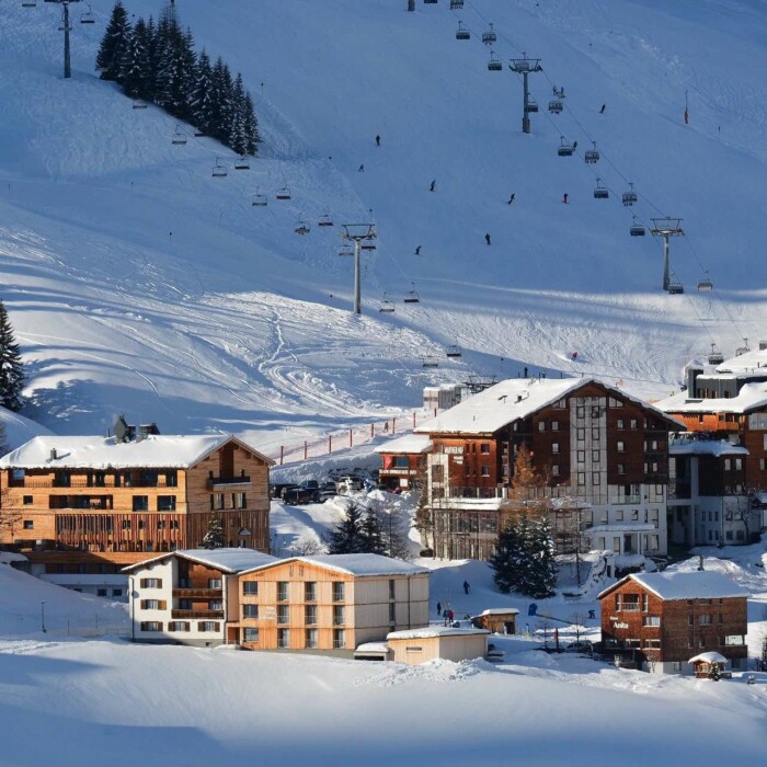 Lodges in Österreich - direkt im Skigebiet auf 1.500 m Höhe - 50 m zum Skilift - traumhafte Lage der Luxus-Lodges